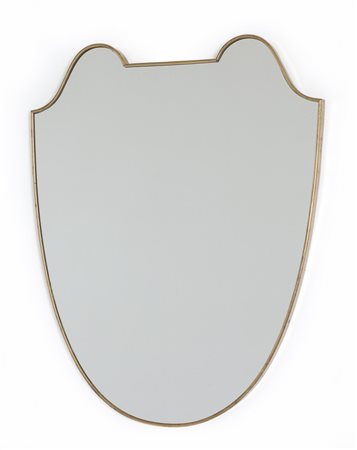UNO SPECCHIO DA PARETE, anni '50. <br>Ottone, 
