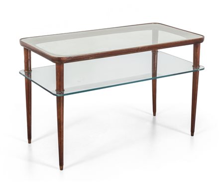 UN TAVOLINO, anni '50. <br>Legno di mogano, 