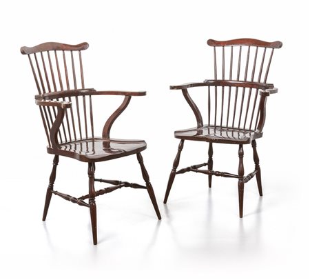 DUE POLTRONCINE, anni '50. <br>Legno di mogano. 