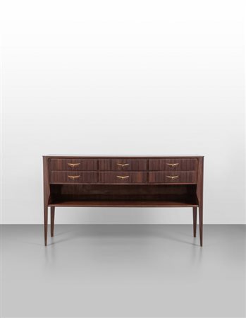 UNA CREDENZA A CASSETTI, anni '50. <br>Legno di 