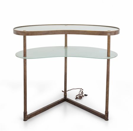 UNA TOILETTE, anni '50. <br>Ottone, vetro 