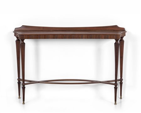 UNA CONSOLE, anni '50. <br>Legno di noce, ottone. 