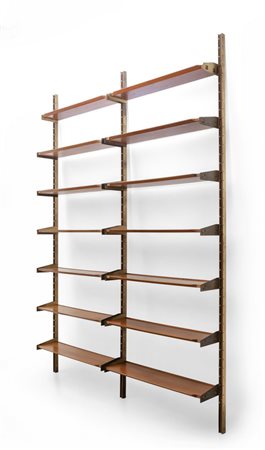 UNA LIBRERIA DA PARETE, anni '60. <br>Ottone, 