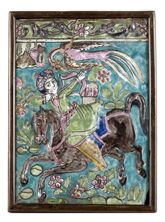 Due piastrelle decorate a rilievo in policromia con figure a cavallo. Iran, Qaj
