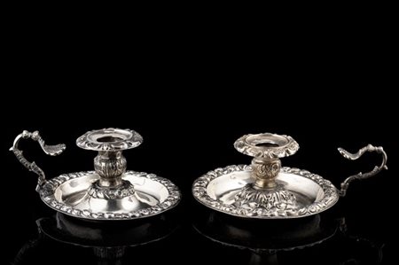 Due bugie in argento decorate a motivi vegetali. Napoli, secolo XIX (g 240) (di