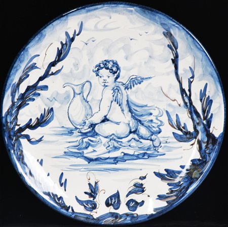 PIATTO IN CERAMICA con decorazioni nei toni del blu cobalto e dell'azzurro...