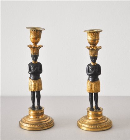 - Due candelieri, XIX sec.;Bronzo, dorato, H 24 cm