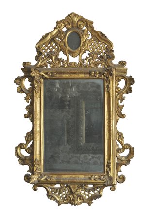 - Grande specchio Rococò, seconda metà del XVIII sec.;Legno dorato, altezza...