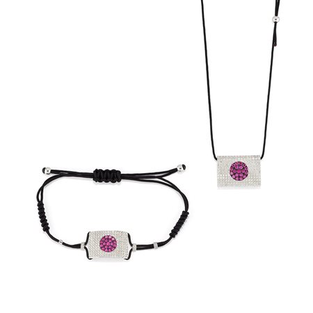 Demi-parure con rubini e diamanti