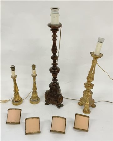 Lotto composto da due candelieri dorati e altri due tripodi di epoche e misure