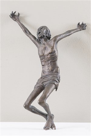 Cristo in bronzo patinato. XX secolo. Cm 61x40.