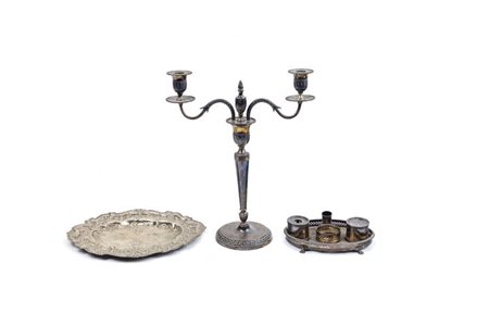 LOTTO DI TRE OGGETTI IN ARGENTO