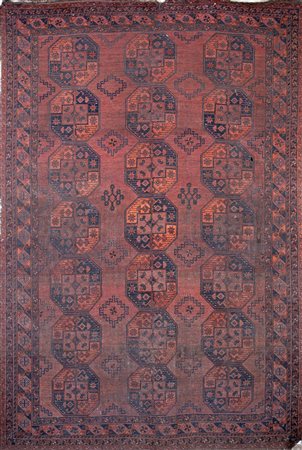 Antico tappeto afghano fondo rosso decorato da ventuno ottagoni disposti su...
