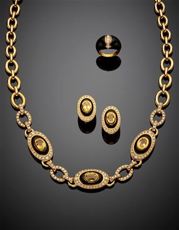 Demi-parure in oro giallo, diamanti per complessivi ct. 4,50 circa e zaffiri gi