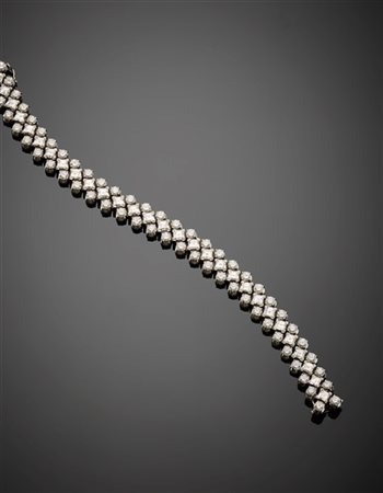 Bracciale in platino e oro bianco con diamanti rotondi e carré per complessivi