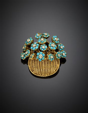 TIFFANY & CO
Broche in oro giallo a cestino con fiori en tremblant rifinita con