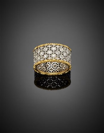 FEDERICO BUCCELLATI
Anello a fascia traforata in oro giallo e bianco rifinito c