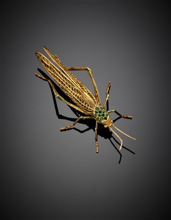 TAGLIABUE
Broche a guisa di cavalletta in oro giallo cesellato rifinito con tin