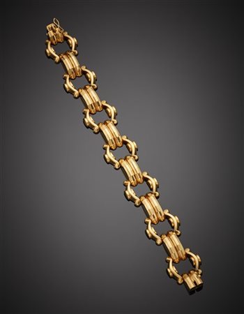 Bracciale modulare in oro giallo, g 25,68 circa, lungh. cm 19,30 circa. Marcato