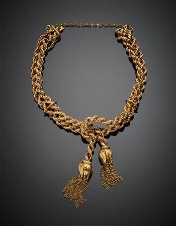 INDUSTRIA ARGENTINA
Bracciale in oro giallo intrecciato con nappe, g 23,33 circ