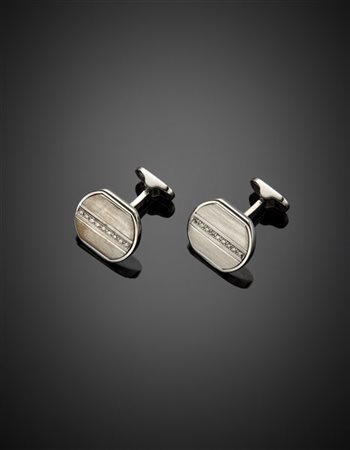 PIAGET
Gemelli in oro bianco rifiniti con piccoli diamanti, g 17,83 circa. Firm