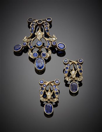 Demi parure in oro bianco, zaffiri e diamanti a mezza rosetta composta da spill
