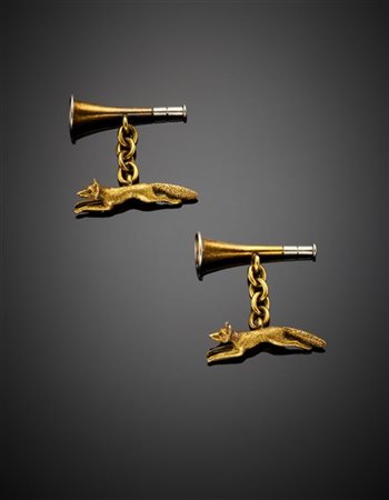 Gemelli in oro giallo e bianco 585/1000 e 750/1000 con simboli della caccia all