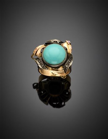Anello in oro 585/1000 e argento con turchese cabochon centrale di mm 13.30 cir