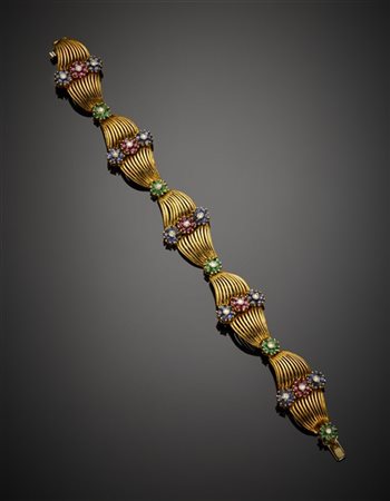 Bracciale modulare in oro giallo con fiori in diamanti, zaffiri, rubini e smera