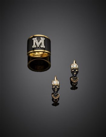 Lotto composto da orecchini in oro giallo 500/1000 e smalto a guisa di piccoli