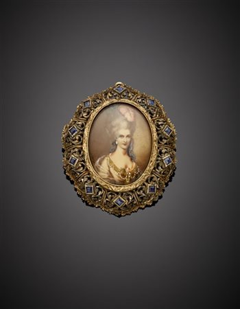 Spilla in oro 333/1000 e argento rifinita con piccoli zaffiri e miniatura, pin