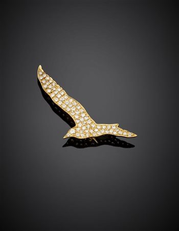 GIO CAROLI
Spilla a gabbiano in oro giallo e diamanti per complessivi ct. 0,50