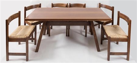 GIOVANNI MICHELUCCI Tavolo in legno con sei sedie della serie Torbecchia....
