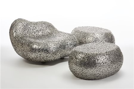 Bannavis Andrew Sribyatta Salotto composto da poltrona, pouf tavolino. Miami, an