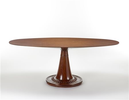 Tavolo in legno di mogano e noce massello, impiallacciato e bordato. Piano elli