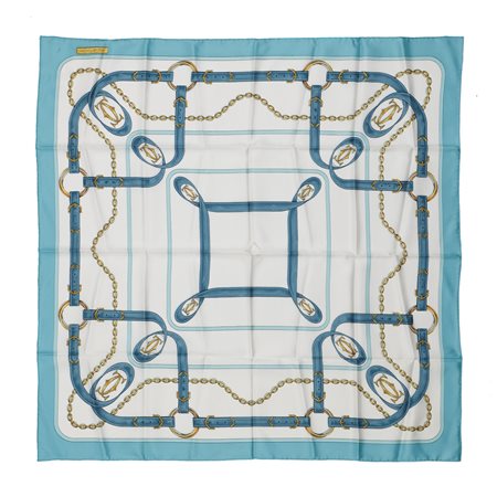 CARTIER  - Foulard in seta con stampe sulla tonalità dei blu e acquamarina su base bianca.