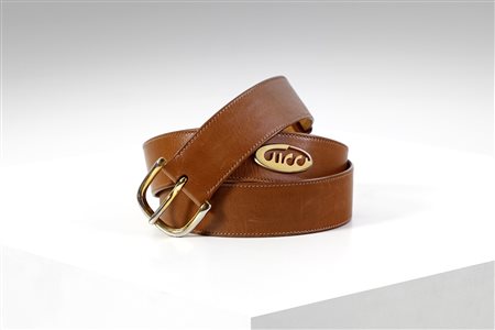  GUCCI - Cintura in pelle color cuoio con fibbia oro. Fine anni 80.