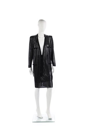 VERSACE GIANNI (1946 - 1997) - Giacca e gonna in maglia metallica con ricami.