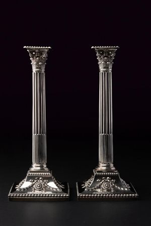 Coppia di candelieri in argento 