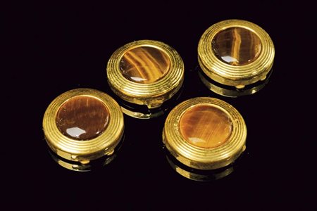Lotto composto da 4 copri bottoni in oro ed occhio di tigre