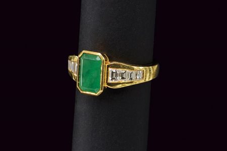 Anello oro con diamanti baguette e smeraldo