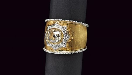 MARIO BUCCELLATI anello a banda in oro due colori e brillante vecchia miniera 