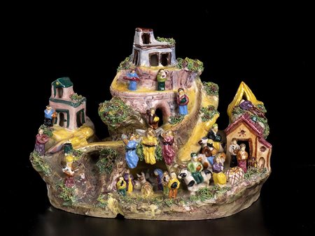 Paese con presepe e persone 