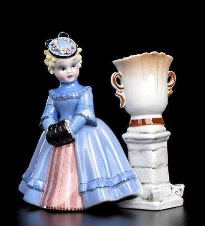 TOSIN<br>Bambina con cappottino azzurro 