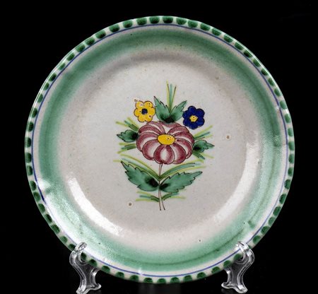 CAS<br>Piattino con decoro di fiore