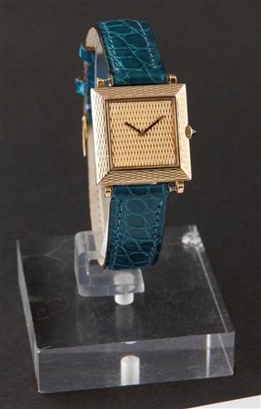 BUCHERER Solo tempo, di forma, anni '60 25x25 Cassa finemente lavorata in oro...