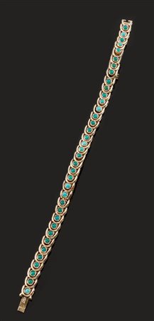 BRACCIALE Bracciale in oro giallo lavorato a maglie snodabili, sommità...