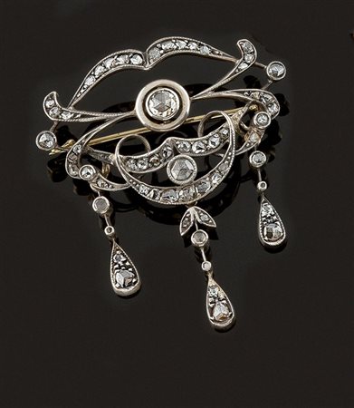 SPILLA CIONDOLO Spilla ciondolo, inizi XX secolo, in oro ed argento, lavorata...