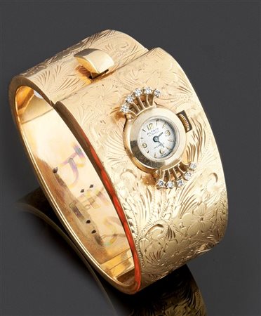 ALTAIR Orologio gioiello in oro giallo 14Kt, lavorato ad onda, inciso e...