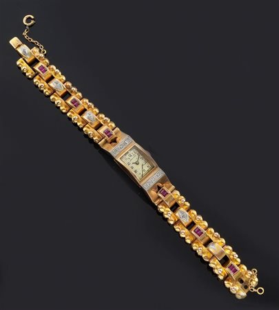 LEONIDAS Orologio gioiello, di forma, anni '40 Cassa e bracciale in oro...